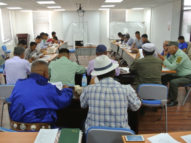 People seated in a room