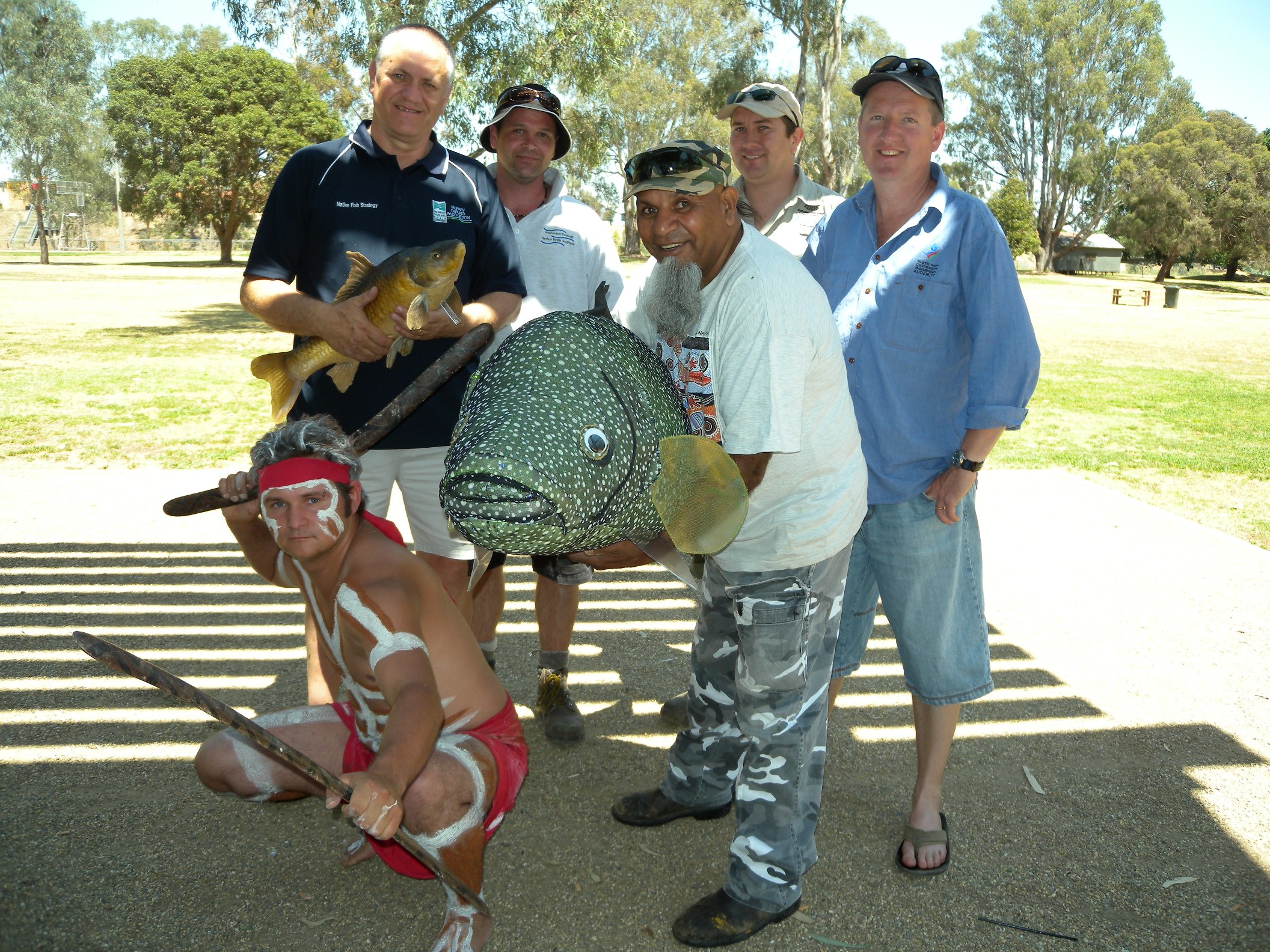 Community members involved in an annual event to remove carp from the Ovens River